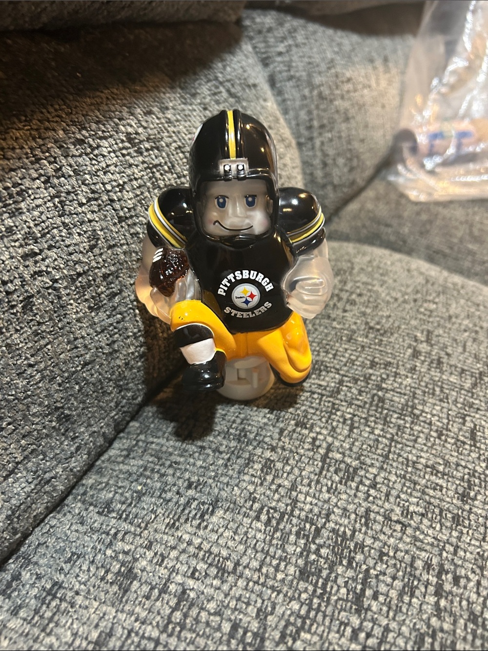 Black & Gold Football Player. Night lite